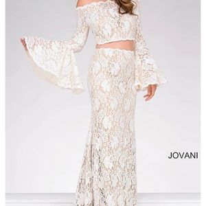 Brand new lace dress loaded with sequins!